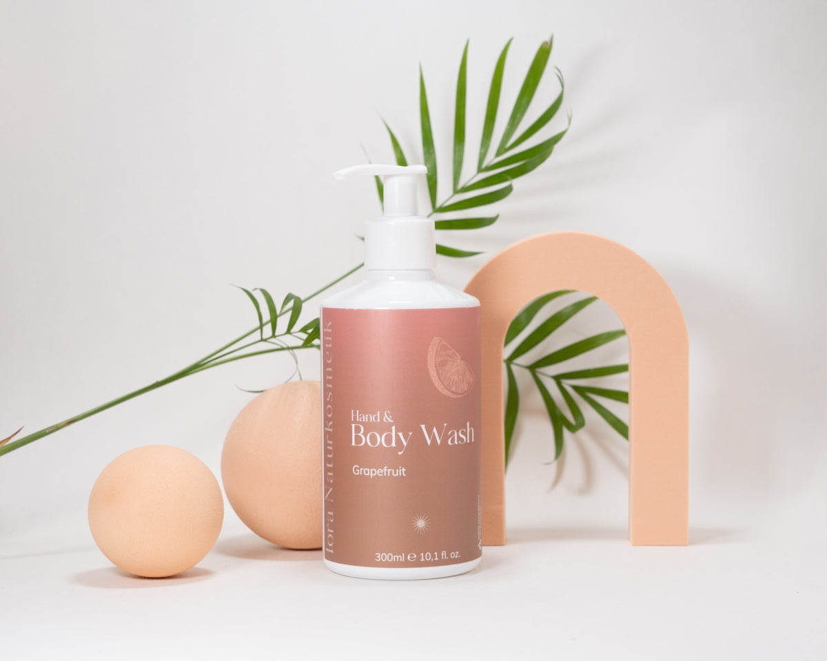 a bottle of liquid next to some eggs